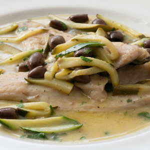 Sea bass fillet with taggiasca olives and zucchini