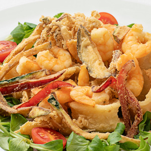 Fried calamari and shrimp with vegetables