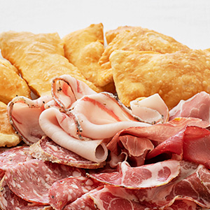 Mixed cold cuts with fried dumplings