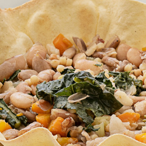 Fregola soup with legumes and vegetables